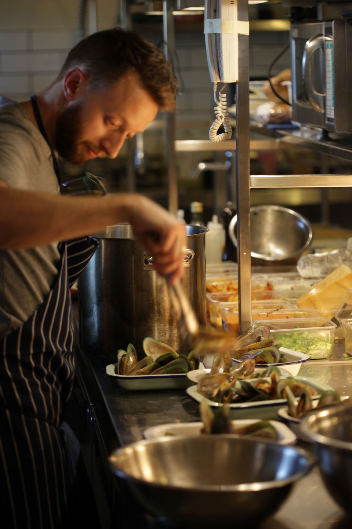 Tim from The Laboratory puts the finishing touches to the green lipped mussels Christchurch, The Laboratory, Green Lipped Mussels