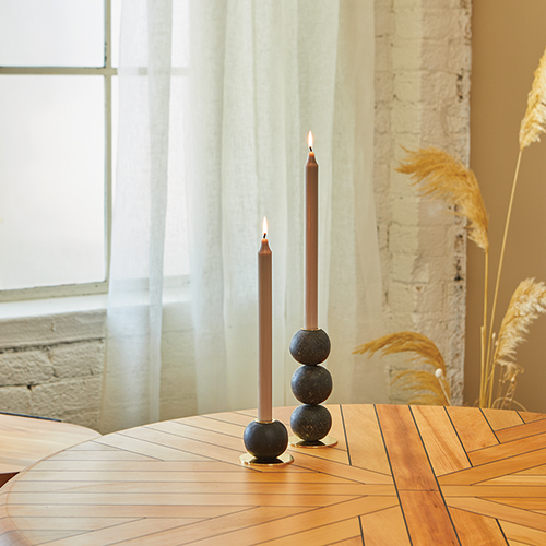 DANCEOFGEOMETRY Candelabras sitting on the BLACKTREEFERN Round Dining Table DANCEOFGEOMETRY Candelabras sitting on the BLACKTREEFERN Round Dining Table